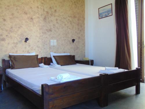 Postel nebo postele na pokoji v ubytování Elvira Hotel