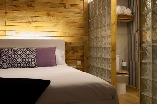 Un pat sau paturi într-o cameră la Quinta do Prado Verde