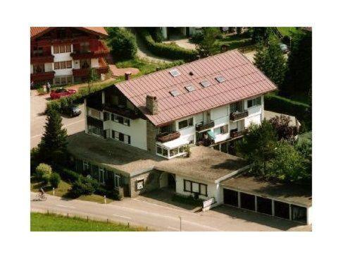 an overhead view of a house with a red roof at Sport-Alpin-Wohnung-9 in Oberstdorf