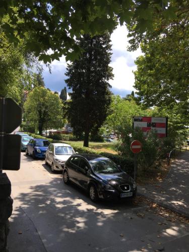 a group of cars parked in a parking lot at Rooms Portorose Center in Portorož