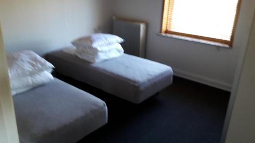 Postel nebo postele na pokoji v ubytování Jerupvej Holiday Home