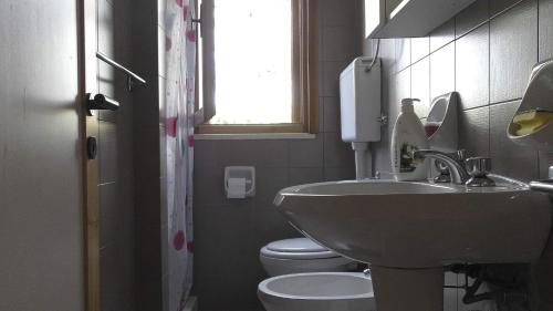Ванная комната в Casa a Villaggio Paradiso