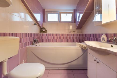 Kúpeľňa v ubytovaní Apartmani Maksan