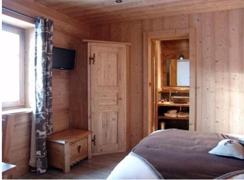 מיטה או מיטות בחדר ב-Chez La Fine