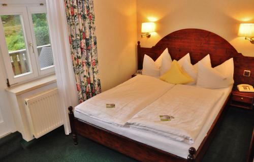 Flair-Hotel Waldfriedenにあるベッド