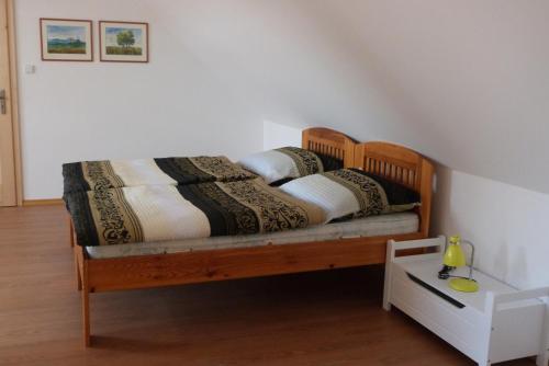 Voodi või voodid majutusasutuse Ubytování u Zámku toas