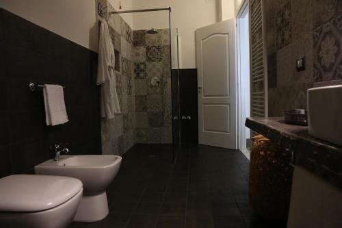 Ein Badezimmer in der Unterkunft Dimi House