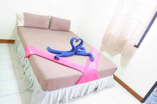 Postel nebo postele na pokoji v ubytování Harmony House-SHA Plus