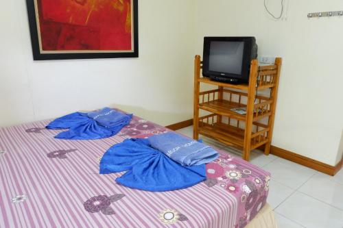 Postel nebo postele na pokoji v ubytování Harmony House-SHA Plus