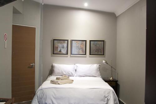 Кровать или кровати в номере House Haven Guesthouse