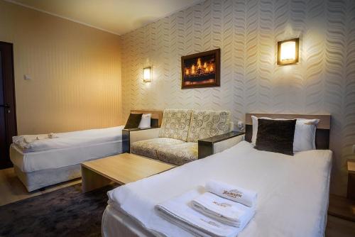 Ліжко або ліжка в номері Complex Jitari