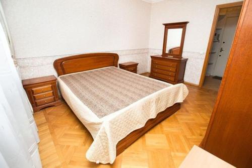 Кровать или кровати в номере Standard Brusnika Apartments Akademicheskaya