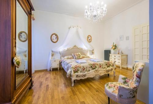 Ένα ή περισσότερα κρεβάτια σε δωμάτιο στο B&B Il Cuore