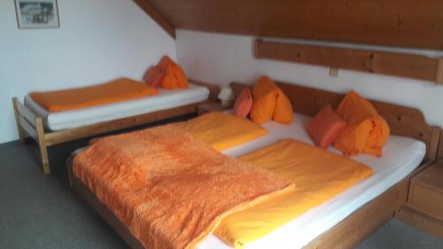 Cama o camas de una habitación en Alpengasthof Hoiswirt