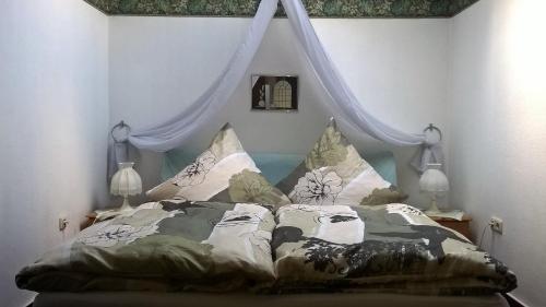 Postelja oz. postelje v sobi nastanitve Pension-Roexe