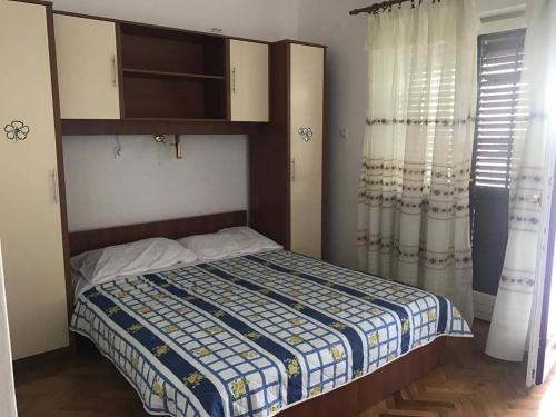 Una cama o camas en una habitación de Apartman Brubnjak