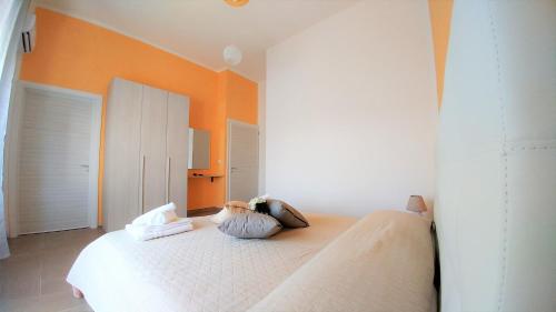 Postel nebo postele na pokoji v ubytování b&b MareSalento