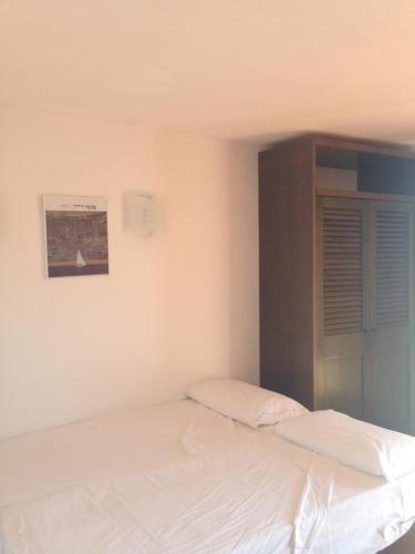 Ένα ή περισσότερα κρεβάτια σε δωμάτιο στο Residenza Chrysalis Bay