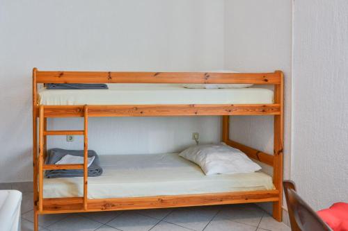 a set of bunk beds in a room at Apartments Dada in Senj