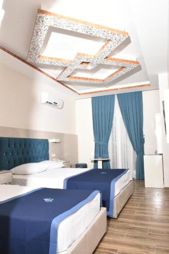 Voodi või voodid majutusasutuse Avesis Hotel toas