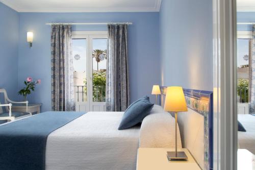 Ένα ή περισσότερα κρεβάτια σε δωμάτιο στο Hotel Plaza Cavana