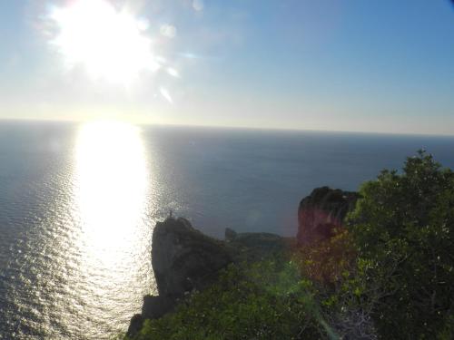 a view of the ocean with the sun shining at Capri Dreaming in Anacapri