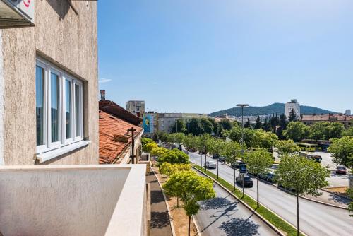 a view of a street from a building at Chris's condo in Split