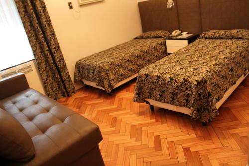 Ayacucho Palace Hotelにあるベッド