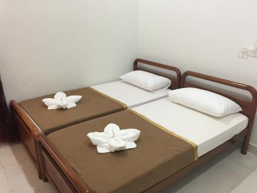 Ana Guest House Jalan Airport Kuantan房間的床