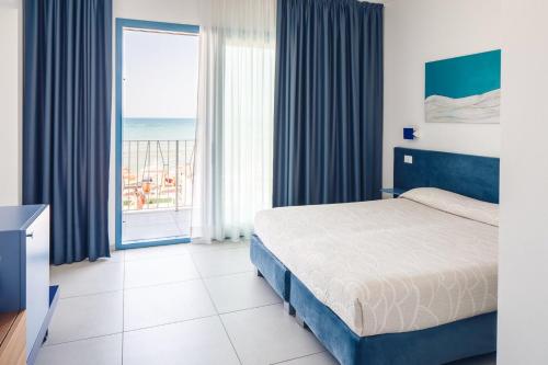 Postel nebo postele na pokoji v ubytování B&B El Gatt