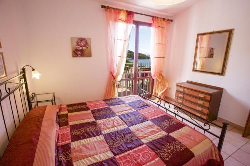 Cama o camas de una habitación en Appartamenti Morcone - Goelba