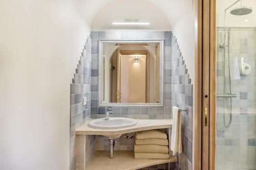 Koupelna v ubytování Hotel Costa Caddu