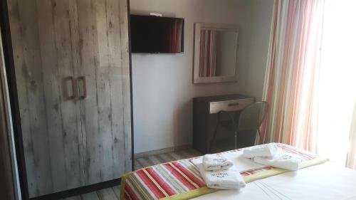 Ένα ή περισσότερα κρεβάτια σε δωμάτιο στο Paramithi Luxury Apartments