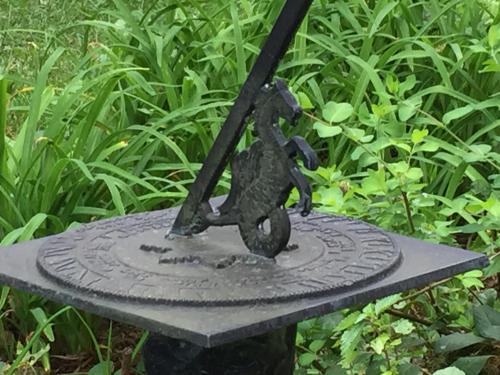 a statue of a bird on a sign on a table at Innkeeper's Place B&B in Stafford Springs
