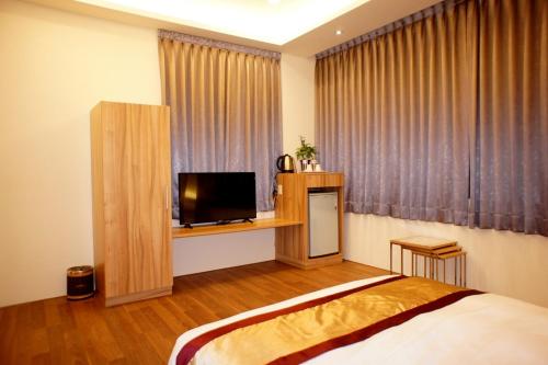 Postelja oz. postelje v sobi nastanitve Simonhall B&B