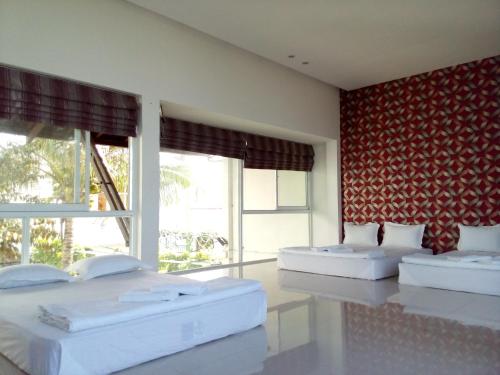 En eller flere senger på et rom på Mekong Hotel & Restaurant