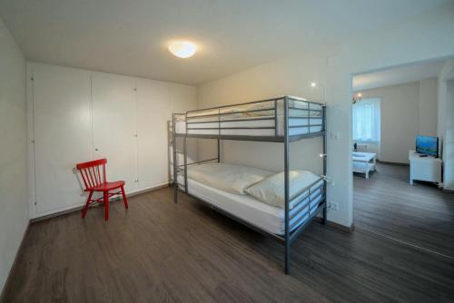 Poschodová posteľ alebo postele v izbe v ubytovaní Beausite Apartments