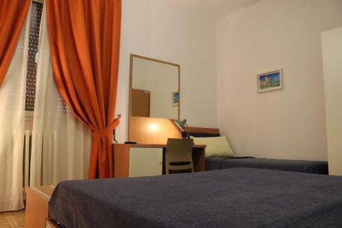 Katil atau katil-katil dalam bilik di Casa Noemi b&b