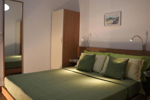 Katil atau katil-katil dalam bilik di Casa Noemi b&b