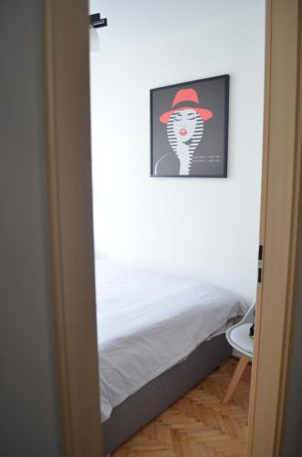 Ένα ή περισσότερα κρεβάτια σε δωμάτιο στο Apartament Telimena