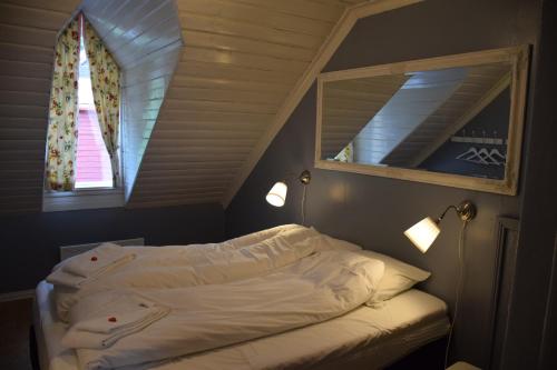 Letto o letti in una camera di Døsen Gård