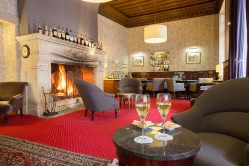 Posezení v ubytování Hôtel & Restaurant Le Relais d'Aumale