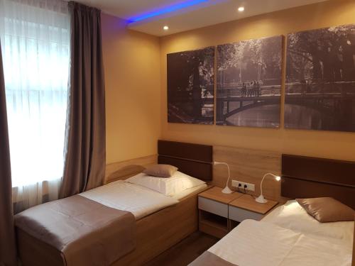 Katil atau katil-katil dalam bilik di Hotel Haus Büderich