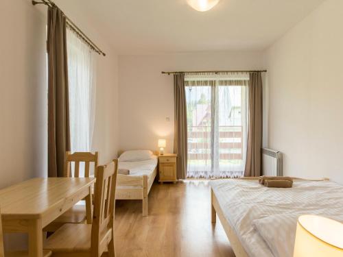 Postel nebo postele na pokoji v ubytování Pokoje Gościnne Bachledzki Wierch