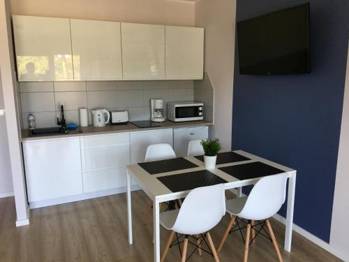Η κουζίνα ή μικρή κουζίνα στο Apartament Silver