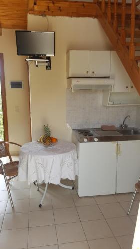 Η κουζίνα ή μικρή κουζίνα στο Epi Apartments