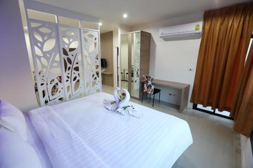 Кровать или кровати в номере S4 Nai Yang Beach - SHA EXTRA PLUS
