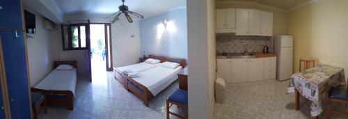 Η κουζίνα ή μικρή κουζίνα στο Epi Apartments