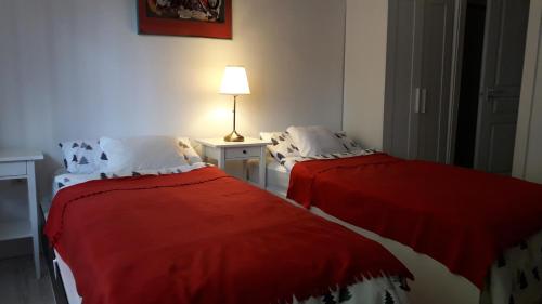 Katil atau katil-katil dalam bilik di Ó-Újlak Apartman