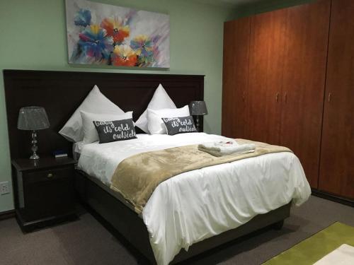 Кровать или кровати в номере Tassili Lodge